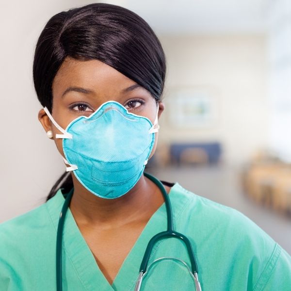Copy-of-Copy-of-Copy-of-Untitled Portrait photo of an African American female nurse with a surgical mask