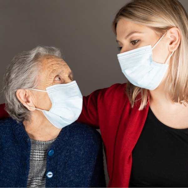 hsw-career A young lady and a senior lady with mask on looking at each other